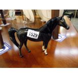 A Beswick horse. ****Condition report**** Undamaged. Height 16cm.