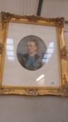 An Edwardian oval watercolour portrait of a lady in a gilt frame, frame approximately 50 x 63 cm.