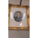 An Edwardian oval watercolour portrait of a lady in a gilt frame, frame approximately 50 x 63 cm.