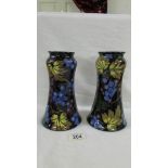 A pair of Royal Stanley ware 1924-28 'Jacobean' pattern 20cm tall vases.