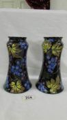 A pair of Royal Stanley ware 1924-28 'Jacobean' pattern 20cm tall vases.