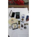 A 1994 Barbados silver dollar, a Grand Lodge medal, medal ribbons etc.