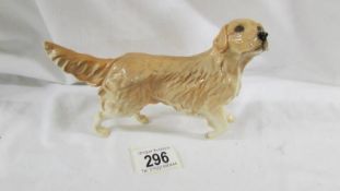 A Royal Doulton Golden Retriever.