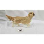 A Royal Doulton Golden Retriever.