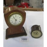 An Edwardian inlaid mahogany Maple & Co., Paris mantel clock and one other.