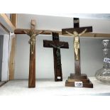 3 wood and metal crucifixes.