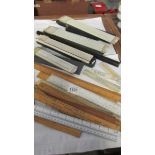 A mixed lot of rulers, slide rules etc., including advertising.