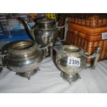 An unusual 3 piece pewter tea set with figural handles. (missing lids).