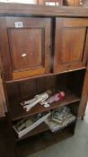 An oak cupboard/bookcase.