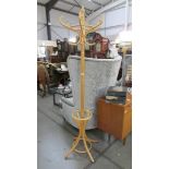 A bent wood hat stand.