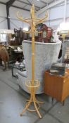 A bent wood hat stand.