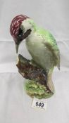 A Beswick woodpecker.