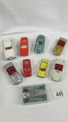 A selection of Dinky and Corgi models including Triumph Spitfires, MGB, Bentley etc.