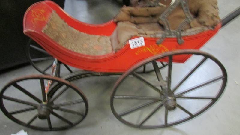 An early dolls push chair. - Image 3 of 3
