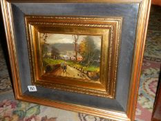 A good oil painting of a rural scene in a superb quality double gilt frame, signed but indistinct.