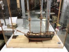 A cased model galleon.