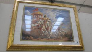 A framed and glazed print of 'Asian War Chariots' in gilt frame.