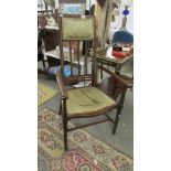 A mahogany inlaid high back elbow chair.