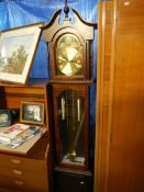 A modern long case clock.