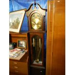 A modern long case clock.