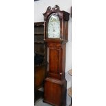 A 19th century painted arch dial (Leicester) long case clock in and oak and mahogany case.