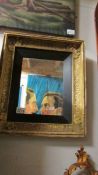 A late 19th / early 20th century gilt framed mirror.