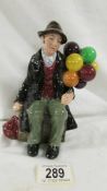 A Royal Doulton figurine, The Balloon man, HN1954. In good condition.