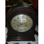 A large oak mantel clock (case needs attention).
