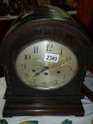 A large oak mantel clock (case needs attention).