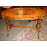 A mid 19th century walnut marquetry inlaid table (some inlay a/f).