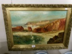 A gilt framed oil on canvas seascape.