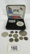 Eleven USA silver coins including 1971 dollar and 1964 JFK stamp and coin set.