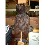 A carved Black Forest articulated wall hanging bear.