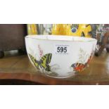A Macdonald bone china bowl decorated with butterflies.