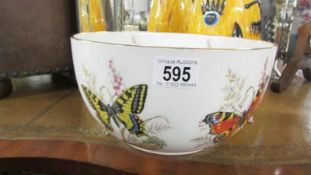 A Macdonald bone china bowl decorated with butterflies.