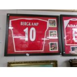 A framed and glazed Arsenal football shirt and photograph collage signed Bergkamp with certificate