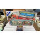 A quantity of boxed Corgi and Dinky including Silver Jubilee taxi, state coach,