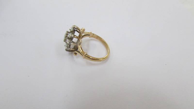 A 9ct gold ring set pearls, size K. - Image 3 of 3