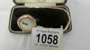 A 9ct gold wrist watch on 9ct gold bracelet (bracelet a/f).