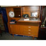 A teak drinks/display cabinet.