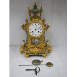 A superb quality French gilded clock with hand painted Sevres panels on all sides,