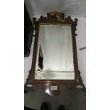 A 19th century mahogany framed mirror.
