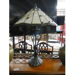 A table lamp with Tiffany style shade.