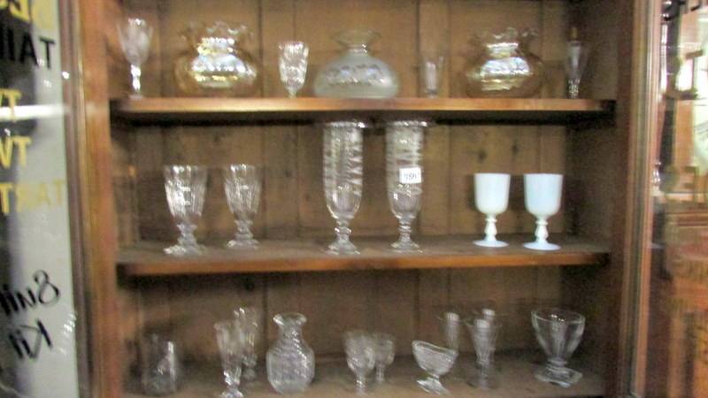 A mixed lot of glass ware including 18/19th century ale and wine glasses, oil lamp shades,