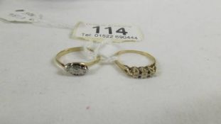 Two circa 1950's three stone diamond rings in 9ct gold, size L and N.