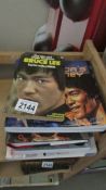 A quantity of Bruce Lee, Kung Fu and Karate books.