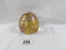 A John Ditchfield Glasform beehive paperweight with sterling silver bee, signed Ditchfield Glasform.