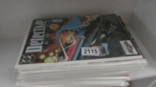 Approximately 36 DC detective comics.