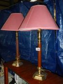 A matching pair of table lamps.