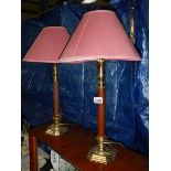 A matching pair of table lamps.